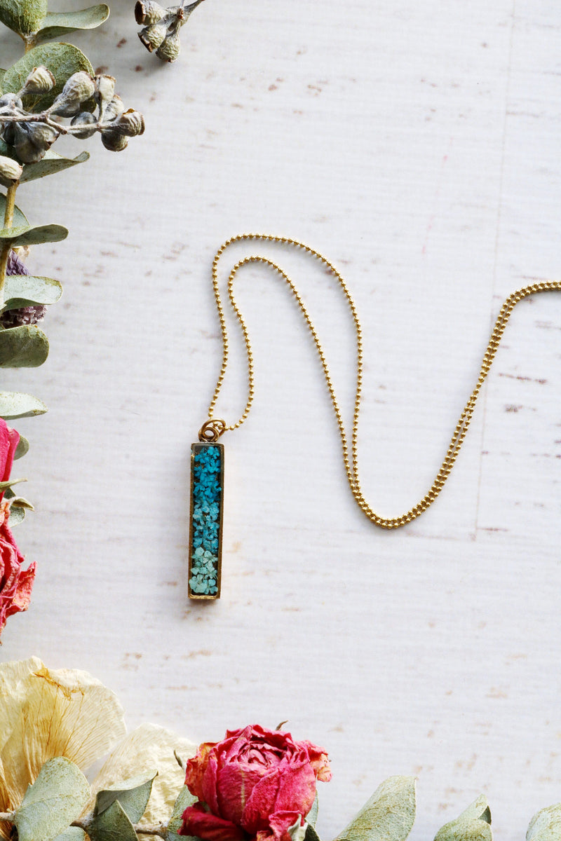 Bar Necklace with Teal to Light Blue Ombré Flowers