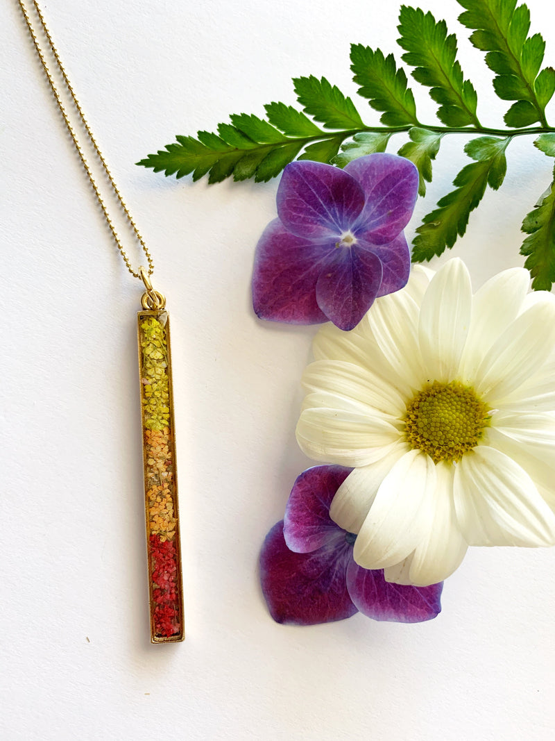 Long Bar Necklace with Ombré Red to Yellow Flowers